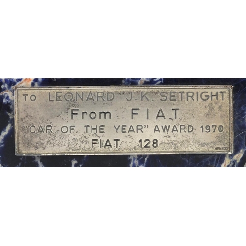 119 - Fiat 1970 car of the year award, awarded to Leonard J K Setright, the silver plated Fiat 128 raised ... 