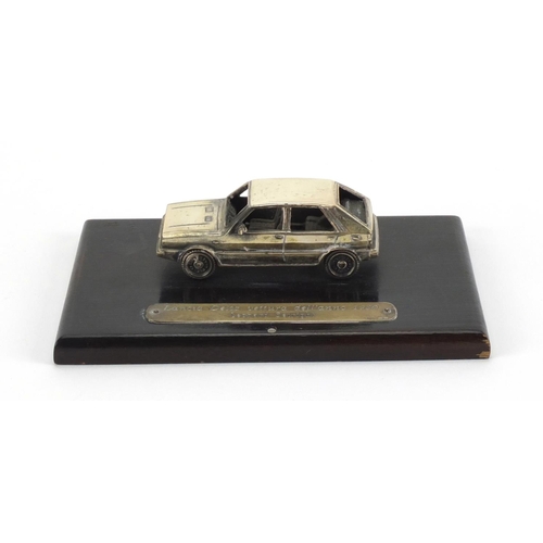 120 - 800 grade silver Fiat 1980 car of the year award, awarded to Leonard Setright, the Lancia delta rais... 