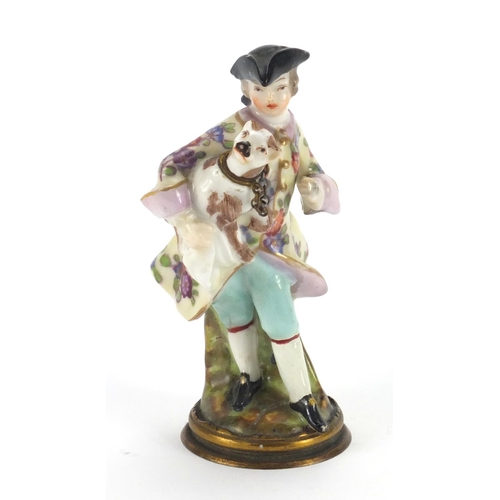 682 - 19th century hand painted porcelain scent bottle of a gentleman holding a dog, with detachable head,... 