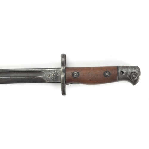 345 - British Military interest Wilkinson 1907 pattern bayonet with wooden grip, impressed marks to the bl... 