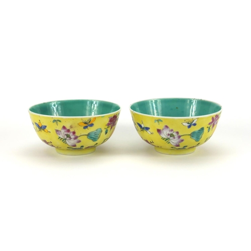 467 - Pair of Chinese porcelain bowls, both hand painted in the famille rose palette with butterflies amon... 