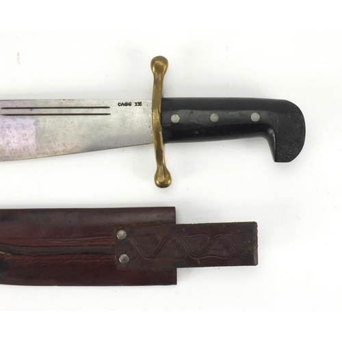 68 - American bowie knife with ebonised handle by Legitimus Collins & Co, with tooled leather sheath, the... 