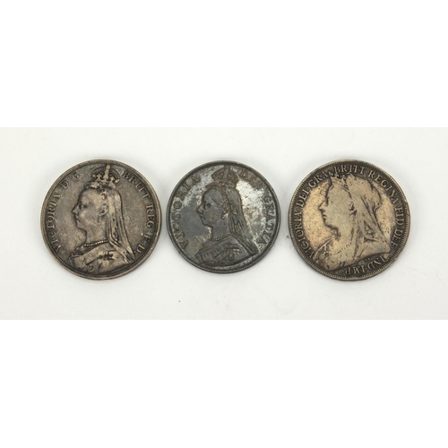 2598 - Three Victorian silver coins comprising two crowns 1895 and 1889, together with a 1889 double florin... 