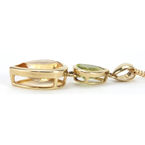 2604 - 9ct gold citrine and Peridot pendant on chain and matching ring, size N, approximate weight 7.4g