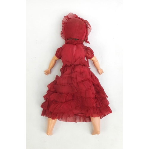 375 - German bisque headed doll by Simon & Halbig with composite limbs and open closes eyes, wearing a red... 