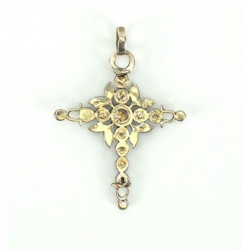 906 - Unmarked white metal diamond cross pendant set with eleven diamonds, 6.5cm long, approximate weight ... 