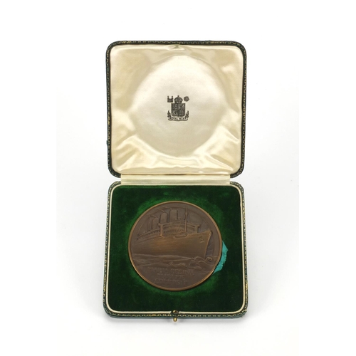 232 - Bronze medallion made form the Queen Mary by The Royal Mint, housed in a velvet lined fitted case, t... 