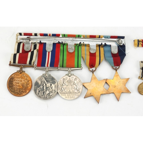 266 - World War II British Military medal group, including Faithful Service medal awarded to LESLIEM.APPS.... 