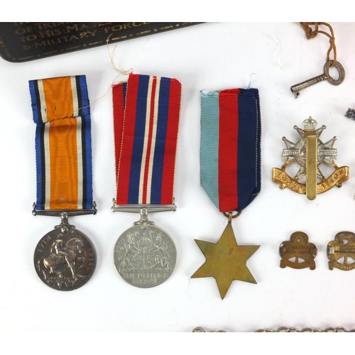 259 - British Military World War I 1914-18 War medal together with other related militaria including a bos... 