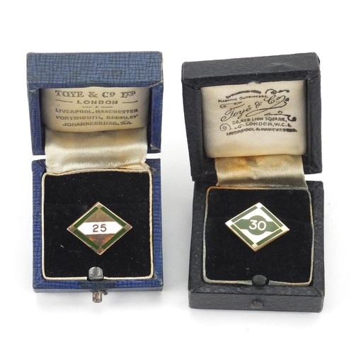 118 - Two 9ct gold and enamel lapel pins, both awarded for long service at BP, one engraved C P J Alexande... 