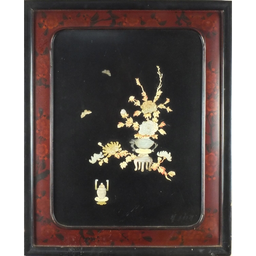 596 - Oriental lacquered panel inlaid with bone and Mother of Pearl, decorated with flowers and butterflie... 