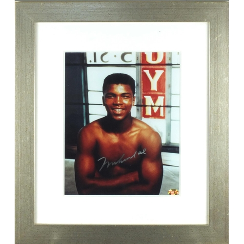 136 - Muhammad Ali ink signed coloured photograph with certificate of authenticity by Hamilton Bland, moun... 