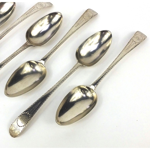 874 - Set of six Irish silver table spoons with engraved decoration, dated 1783,  each 22cm in length, app... 