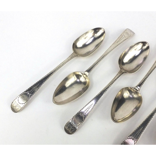 874 - Set of six Irish silver table spoons with engraved decoration, dated 1783,  each 22cm in length, app... 