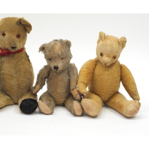 377A - Six antique and later bears including straw filled examples and a Chad Valley hygienic example, all ... 