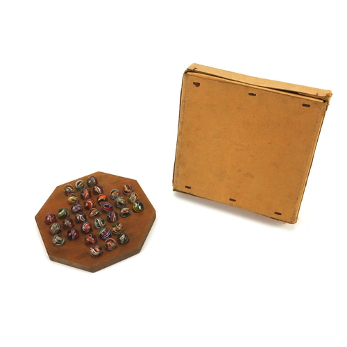 390 - 19th century marble solitaire game with box, the board 16cm in diameter