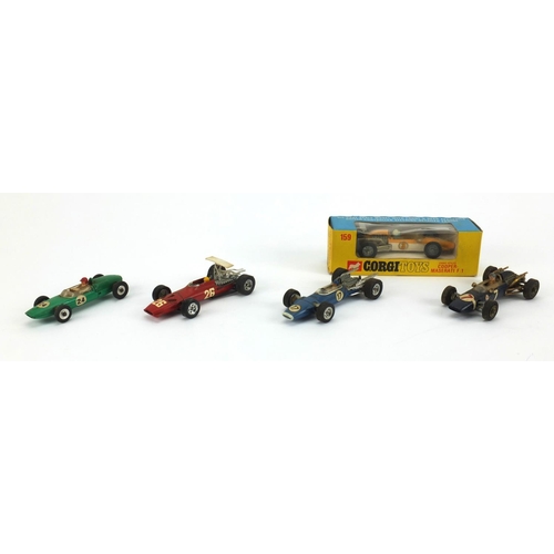 398 - Five Dinky and Corgi die cast racing vehicles all boxed, comprising a Ferrari F1 1422, Matra F1 1417... 