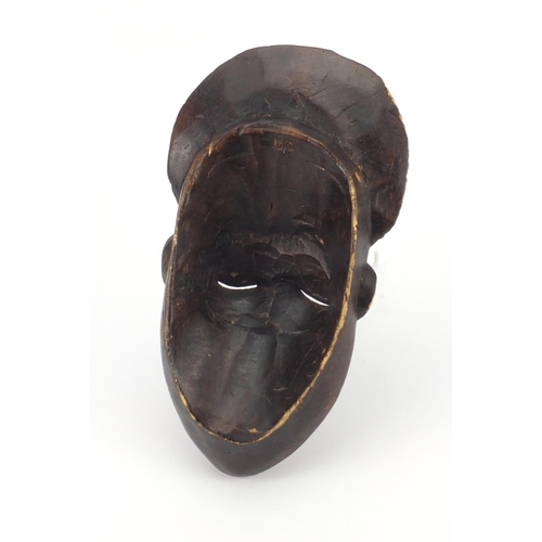 644 - Tribal interest carved wooden face mask, 32cm high