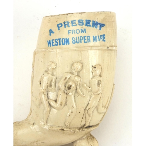 86 - Present from Weston-super-Mare clay pipe decorated with footballers, registration number 241693, imp... 