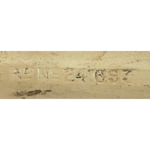 86 - Present from Weston-super-Mare clay pipe decorated with footballers, registration number 241693, imp... 