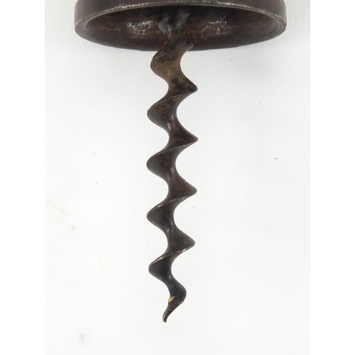 79 - 19th century steel corkscrew with wooden handle and side brush, 18cm in length