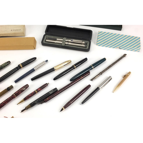 100 - Fountain pens, ball point pens and propelling pencils including a silver coloured metal dip pen, wit... 