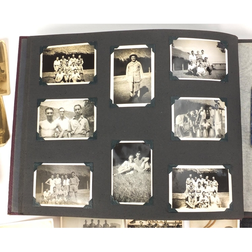 321 - Predominantly World War II black and white photographs including Military, some housed in two albums... 