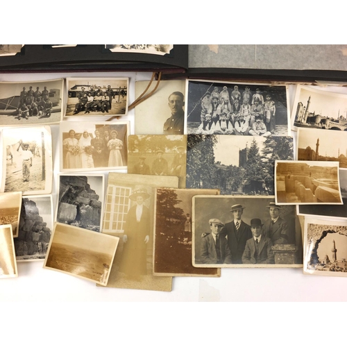 321 - Predominantly World War II black and white photographs including Military, some housed in two albums... 