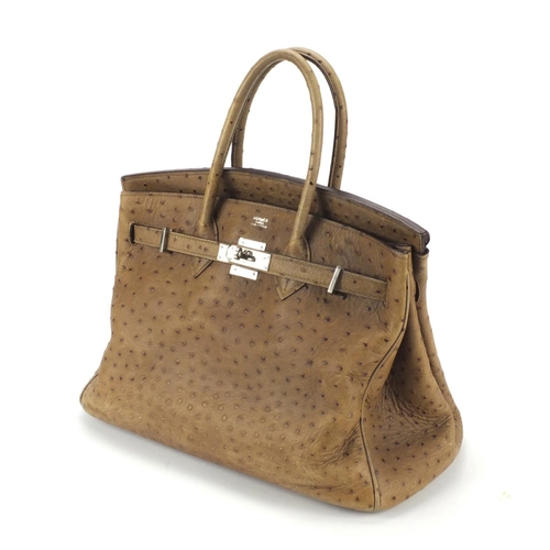 19 - Hermes of Pairs, France Ostrich leather Birkin, 25cm high x 38cm wide excluding the handles.

We hav... 