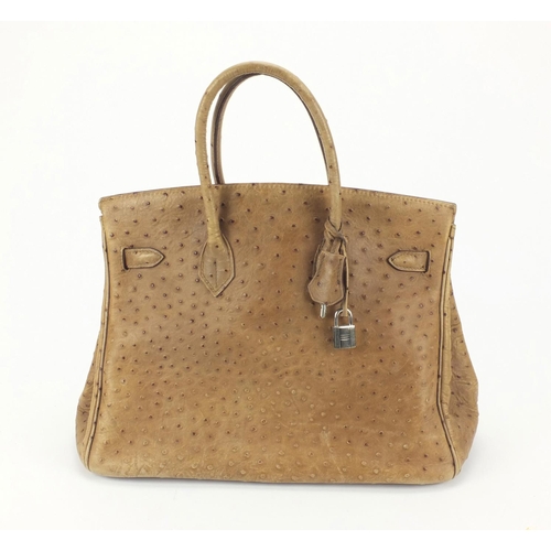 19 - Hermes of Pairs, France Ostrich leather Birkin, 25cm high x 38cm wide excluding the handles.

We hav... 