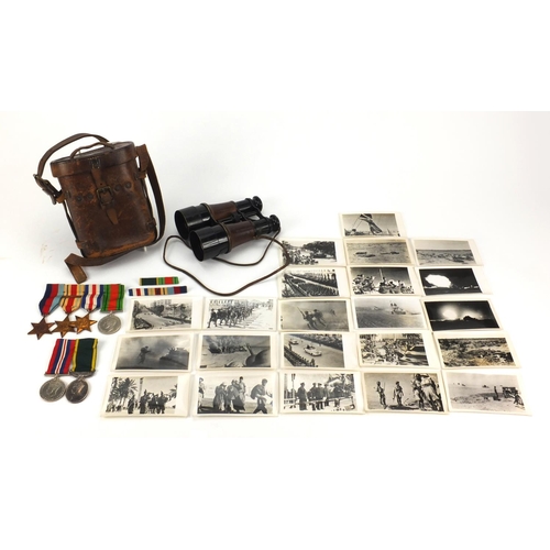 261 - British Military World War II medal group, black and white photographs and binoculars comprising The... 