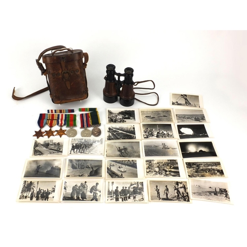 261 - British Military World War II medal group, black and white photographs and binoculars comprising The... 