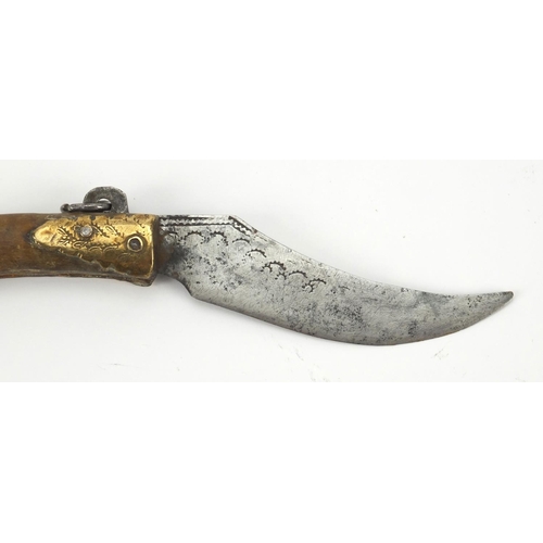 69 - Antique folding knife with engraved steel blade, 14cm wide when closed