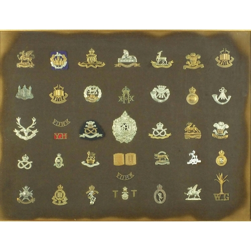 276 - Two framed displays of British Military cap badges including The Welch, Seventh Queen own Hussars, A... 