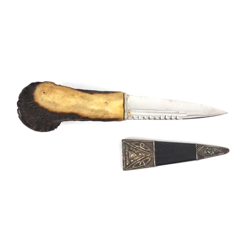 70 - Scottish Skean-Dhu with bone handle and siver mounted leather sheath with silver mounts, 19.5cm in l... 