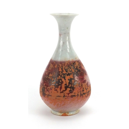 522 - Chinese pottery red under glazed yuhuchun vase, 24cm high