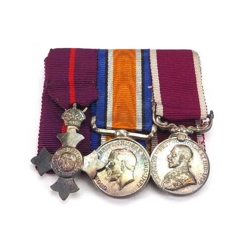 328 - British Military miniature medals together with two hand painted wooden soldiers in uniform, the min... 