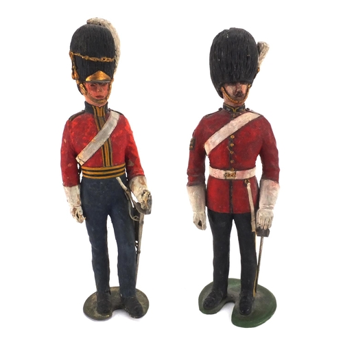 328 - British Military miniature medals together with two hand painted wooden soldiers in uniform, the min... 