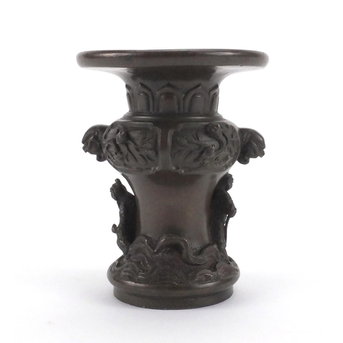 574 - Chinese bronze vase cast with mythical figures and creatures, 12cm high