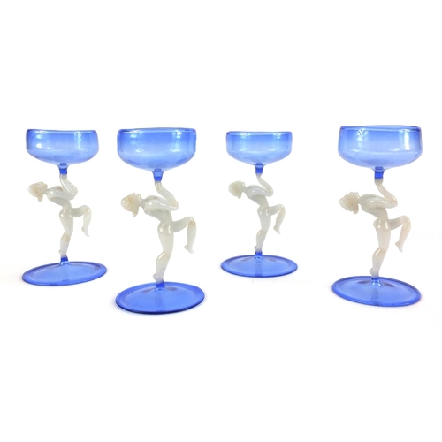 707 - Bimini Werkstatte decanter and four drinking glasses with four figural stemmed drinking glasses, the... 