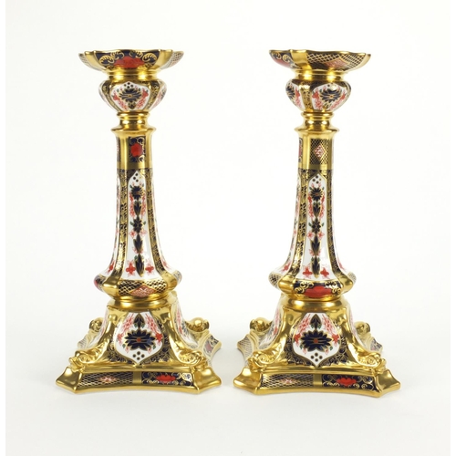 2121 - Large pair of Royal Crown Derby old Imari pattern candlesticks with dolphin and gold block design, b... 