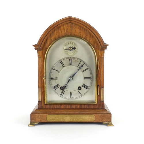 2221 - Edwardian inlaid oak mantle clock with arched top and silvered dial with Roman numerals, WH SCH, 29c... 