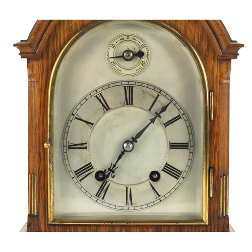 2221 - Edwardian inlaid oak mantle clock with arched top and silvered dial with Roman numerals, WH SCH, 29c... 