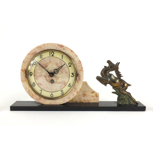 2212 - Art Deco marble mantle clock with garniture, the mantle clock with Arabic numerals and mounted with ... 