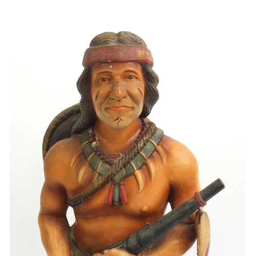 2105 - Floor standing figure of an Indian Warrior, 93cm high