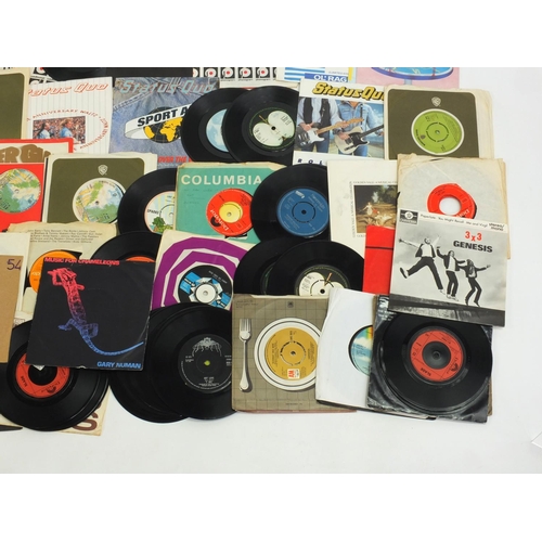 2849 - Rock vinyl 45Rpm records including Status Quo and Alice Cooper examples