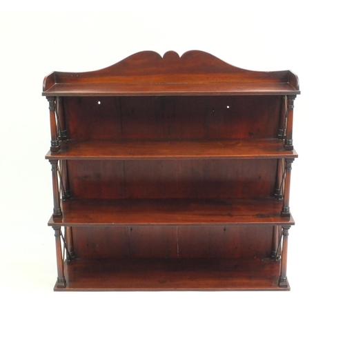 2049 - Mahogany three tier wall hanging  bookcase with turned  supports, 77cm high x 79cm wide x 16cm deep