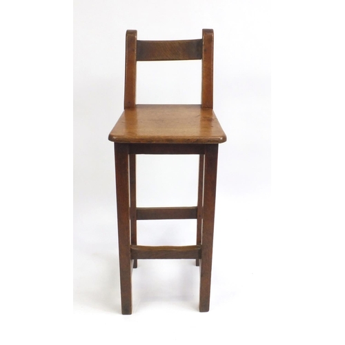 2087 - Arts & Crafts oak clerks chair, 94cm high