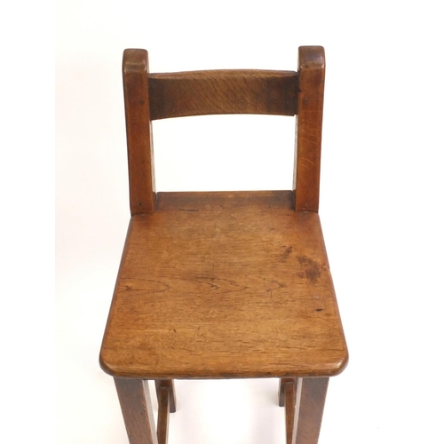 2087 - Arts & Crafts oak clerks chair, 94cm high