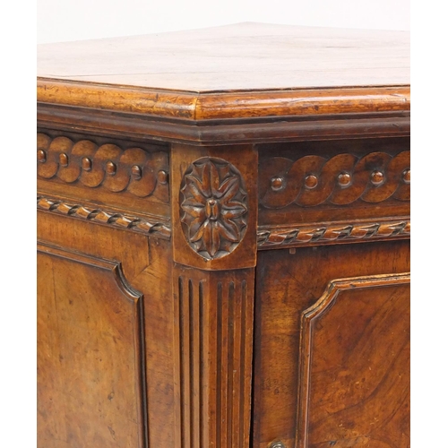 2040 - Adams style carved walnut corner cupboard raised on reeded fluted legs, 84cm high x 87cm wide x 71cm... 